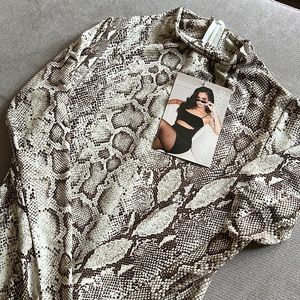 Naked Wardrobe Snakeskin jumpsuit! NEVER WORN WITH TAGS STILL ATTACHED!